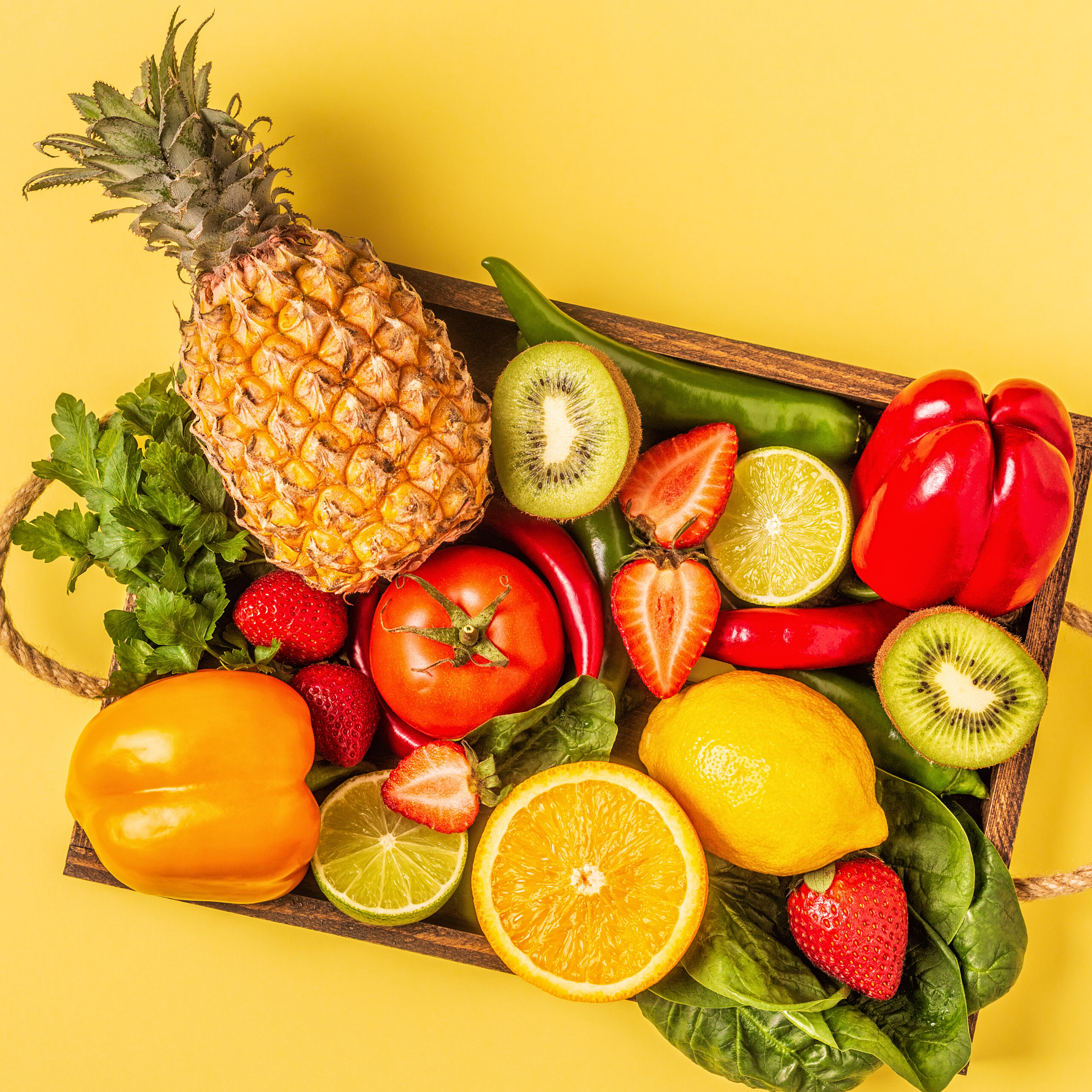 Fruits and vegetables rich in vitamin C in box.