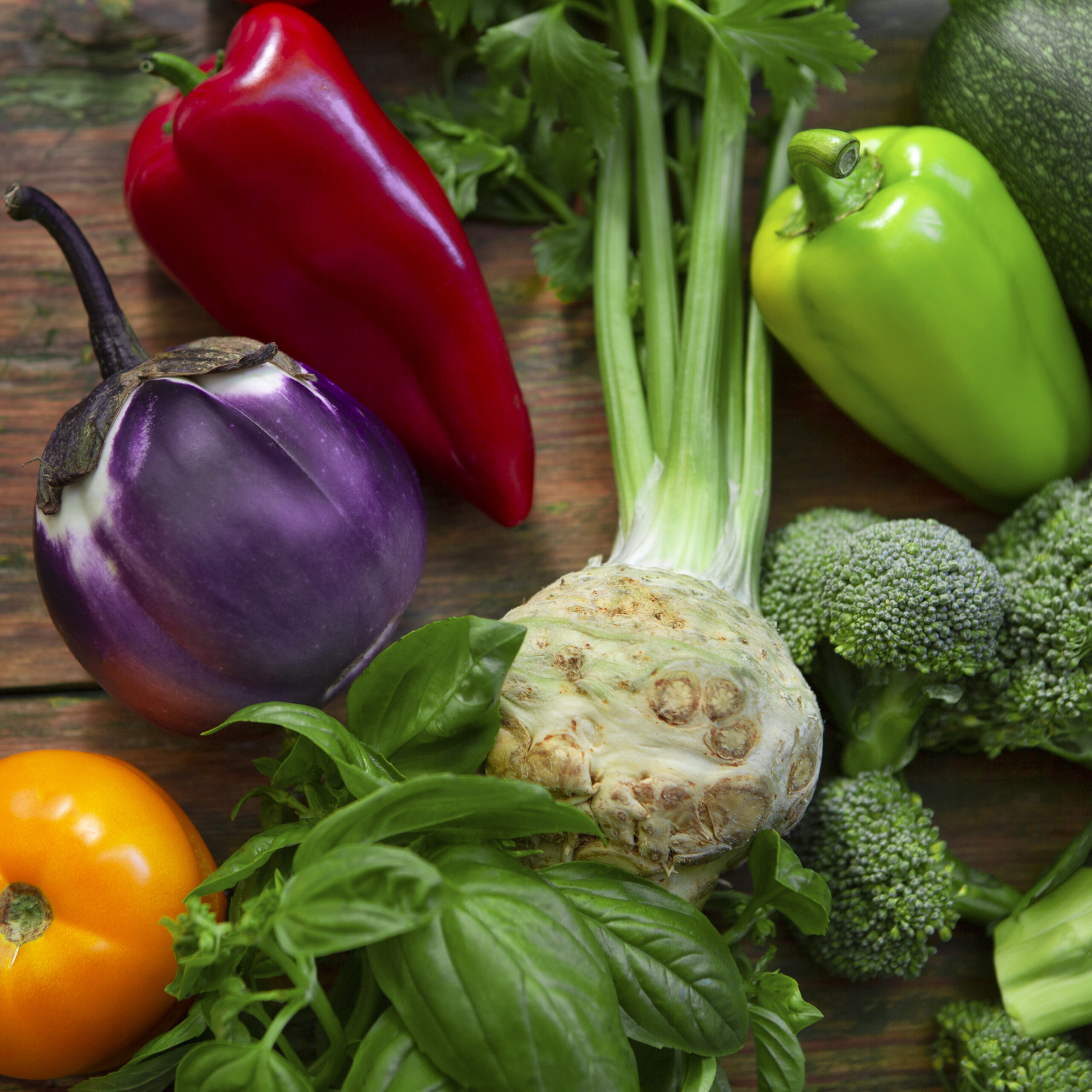 Close up of fresh and natural vegetables on wood
